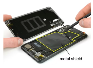 Internal metal shield in a smartphone reducing electromagnetic coupling between electronic sections