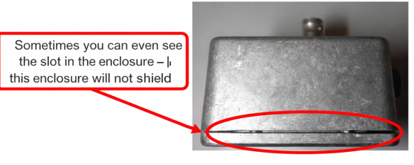 Visible seam in a metal enclosure creating a shielding discontinuity